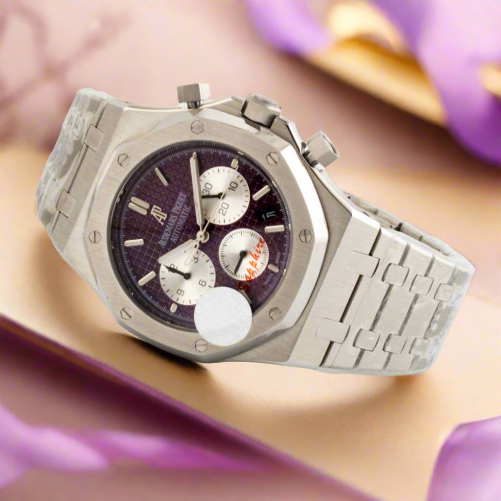 Luxury watch with a silver bracelet on a white background